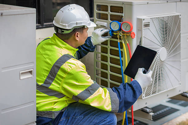 Professional Hvac technician working in Harper, TX